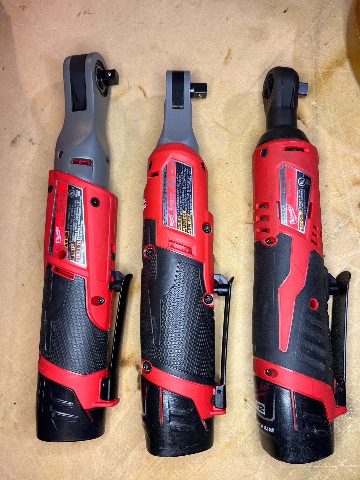 Can hold any one of these 3 M12 ratchets WITH a battery