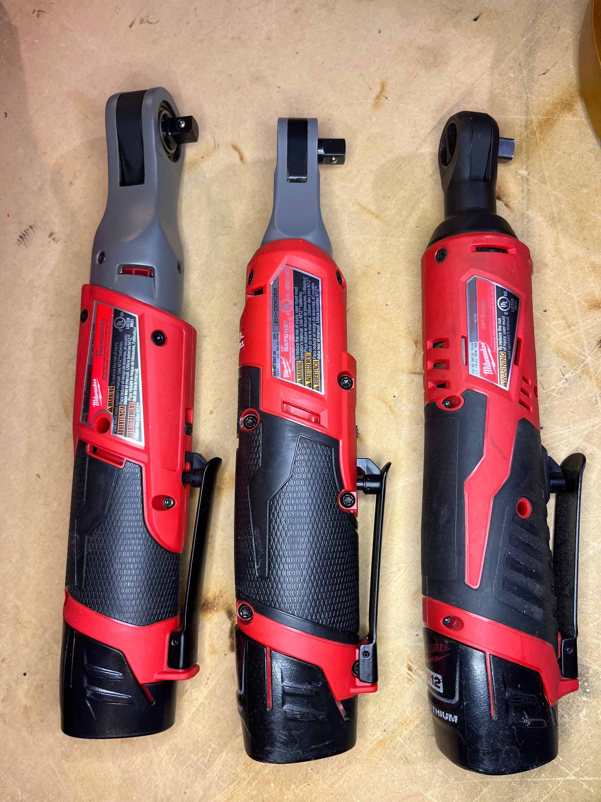 Can hold any one of these 3 M12 ratchets WITH a battery